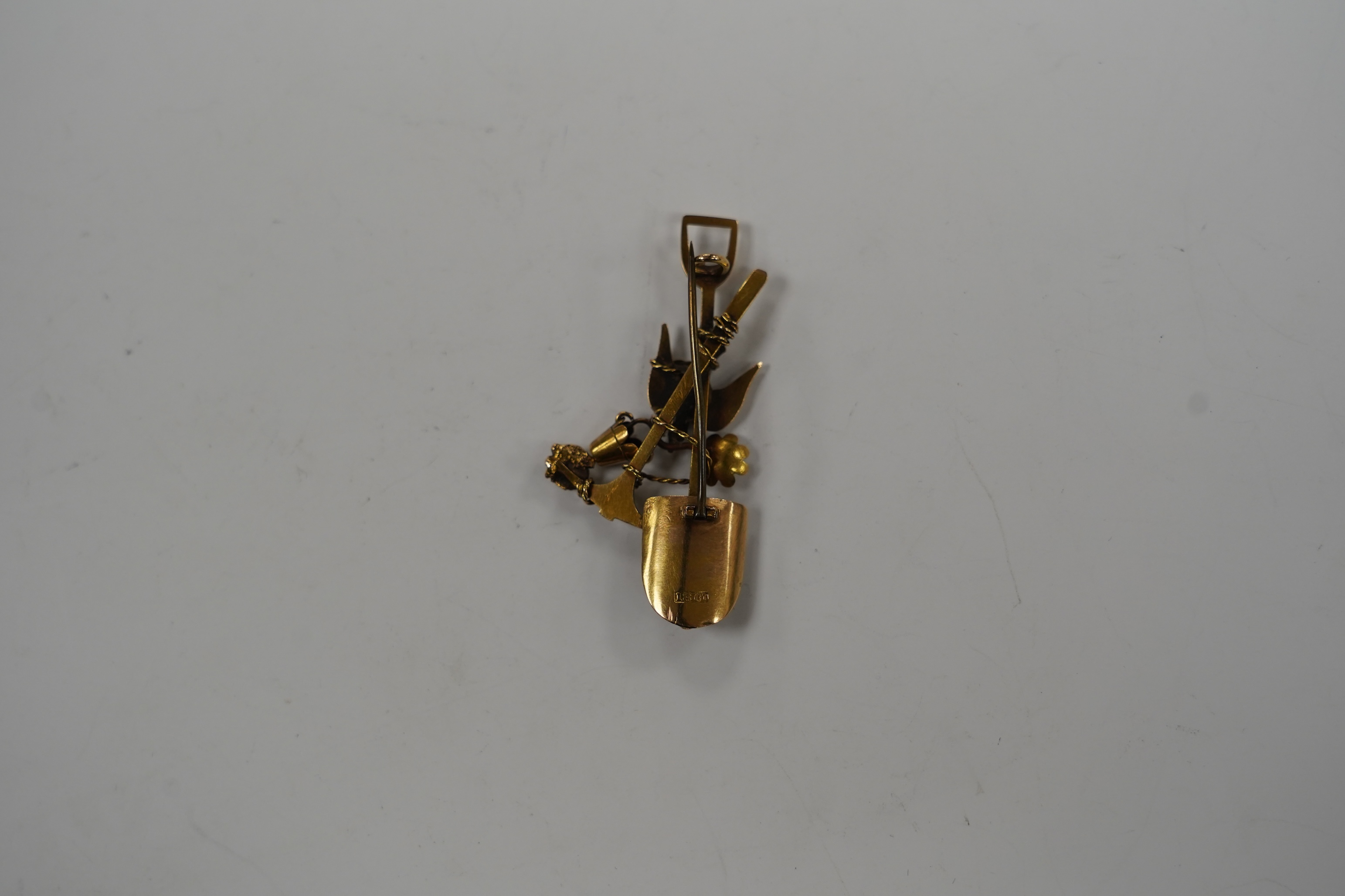 An early 20th century 18ct 'Australian miner's' brooch, 55mm, 9.2 grams.